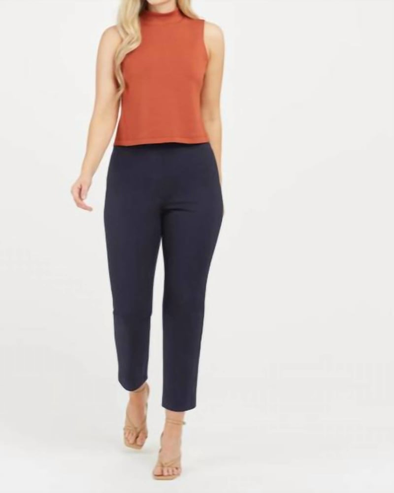 Front of a model wearing a size L Polished Ankle Slim in Navy in Navy by Spanx. | dia_product_style_image_id:343315